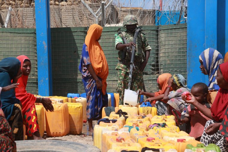 ATMIS troops supply water to IDPs