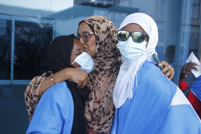 Migrants who survived Madagascar boat tragedy arrive back in Somalia.